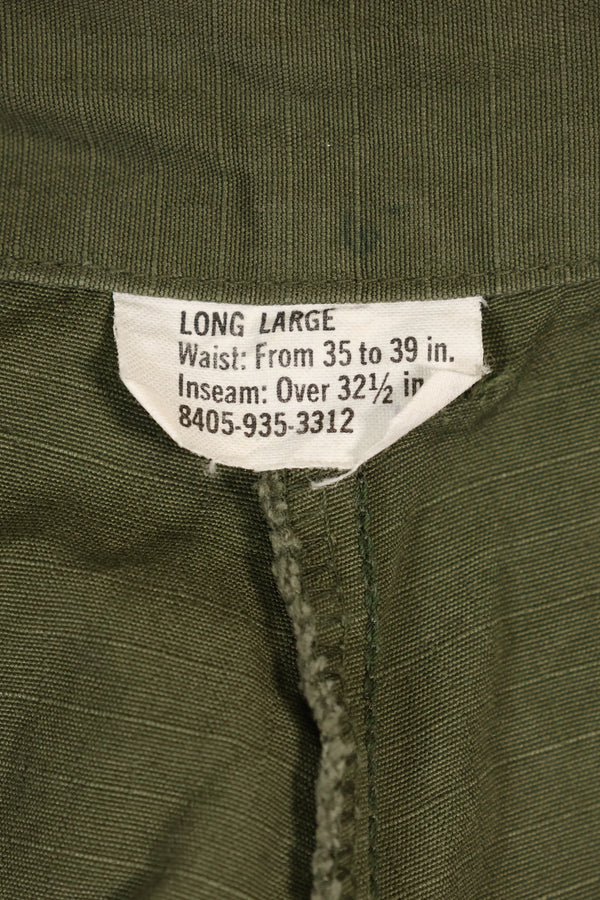 1967 Contract L-L 4th Model Jungle Fatigue Pants in good condition, faded, used.