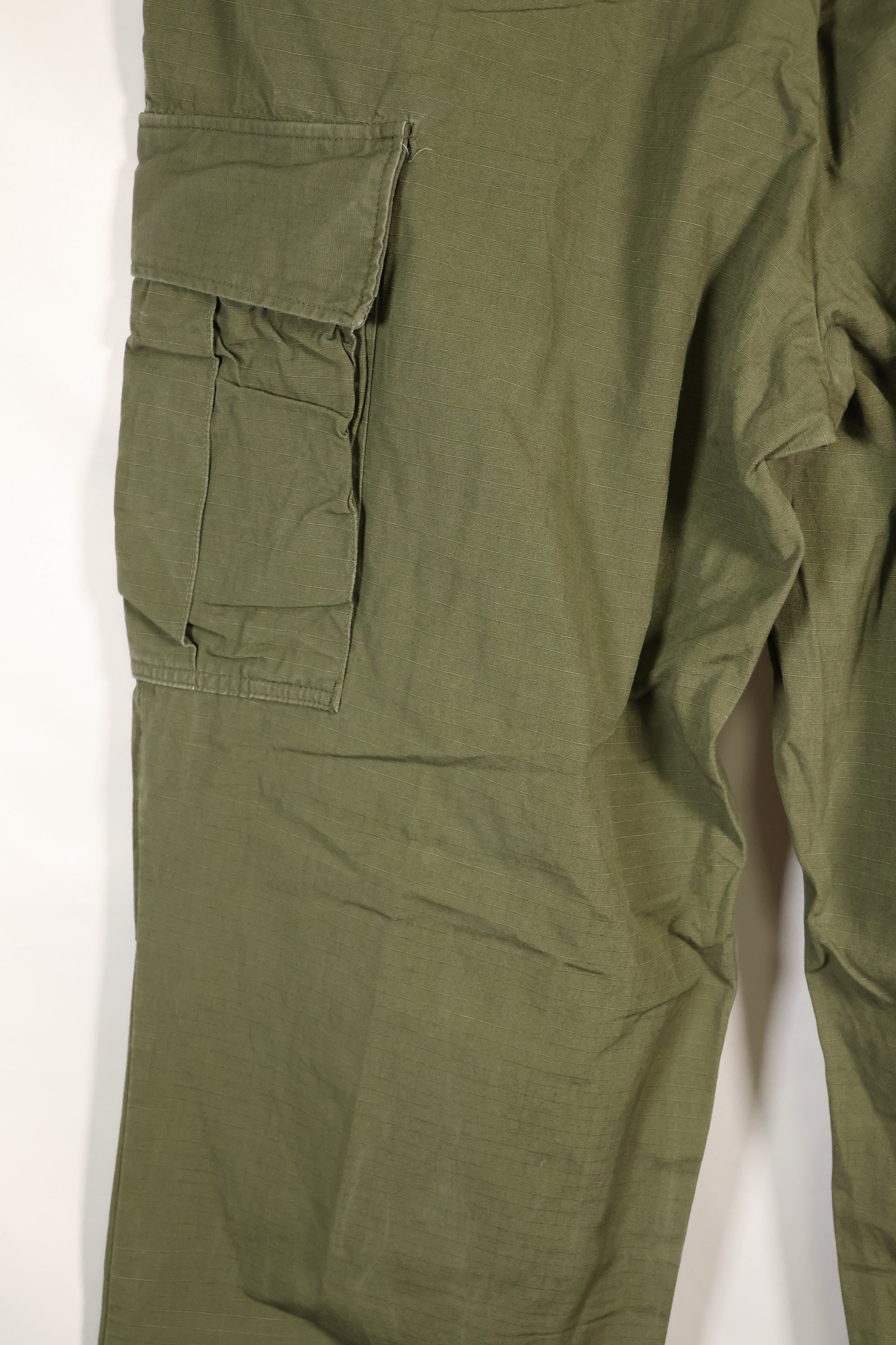 1967 Contract L-L 4th Model Jungle Fatigue Pants in good condition, faded, used.