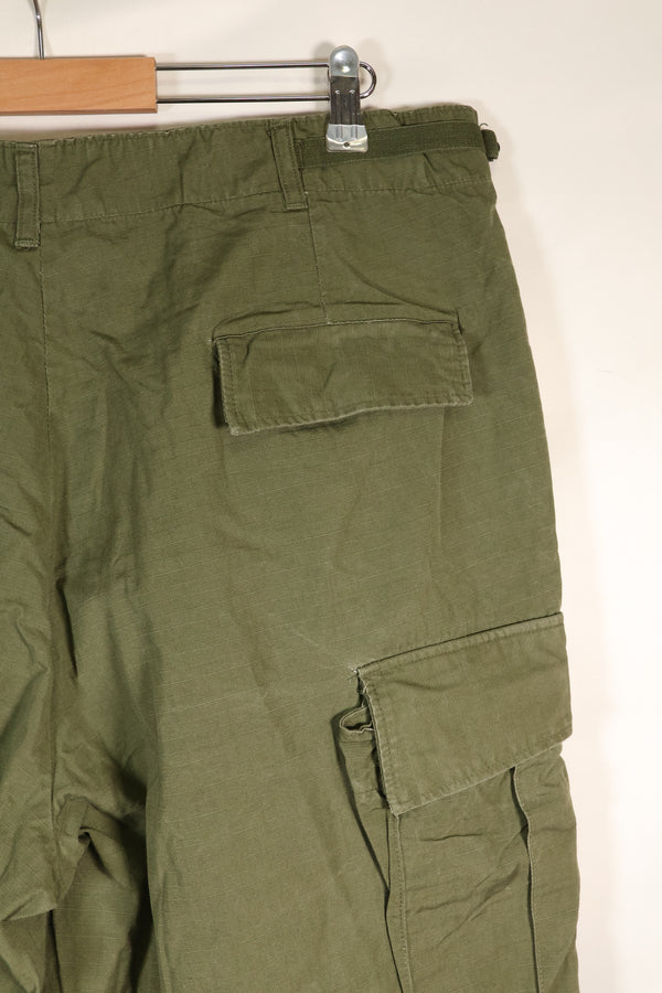 1967 Contract L-L 4th Model Jungle Fatigue Pants in good condition, faded, used.