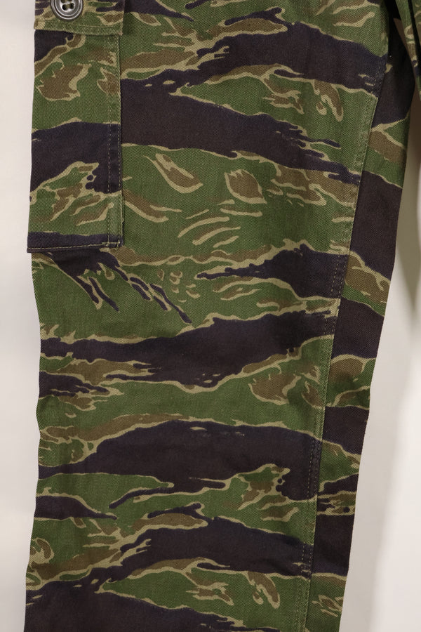 Real tiger stripe pants, gold tiger derived pattern, missing button, almost unused.