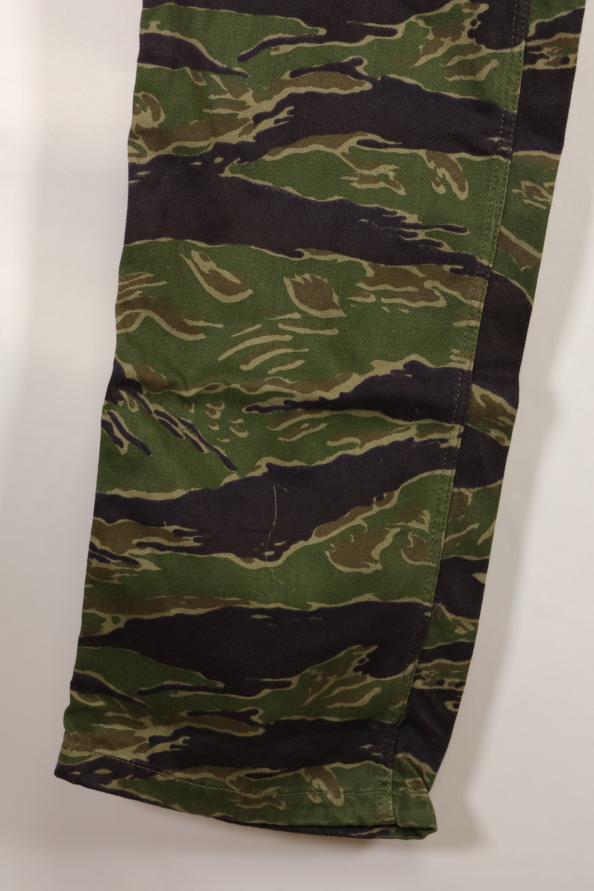 Real tiger stripe pants, gold tiger derived pattern, missing button, almost unused.