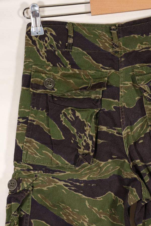 Real tiger stripe pants, gold tiger derived pattern, missing button, almost unused.