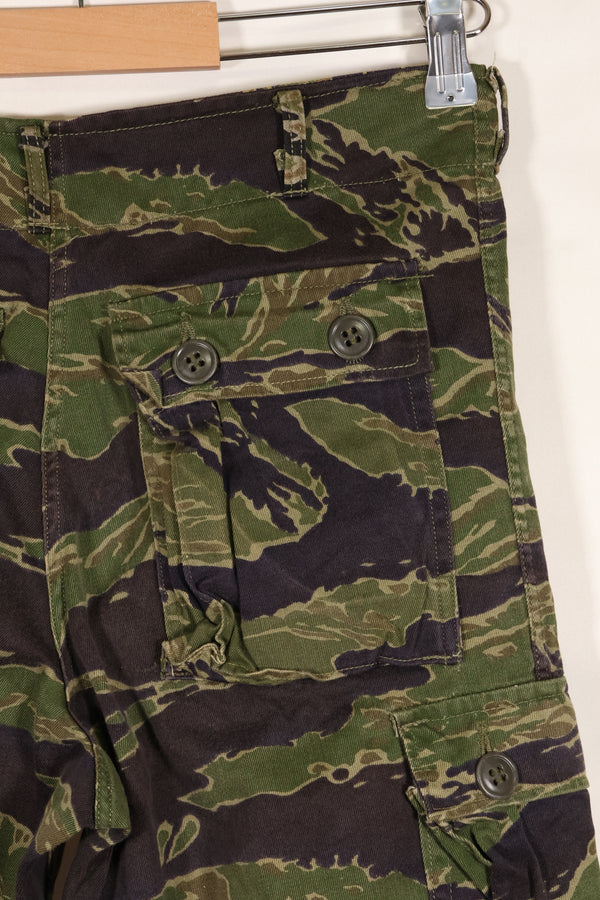 Real tiger stripe pants, gold tiger derived pattern, missing button, almost unused.