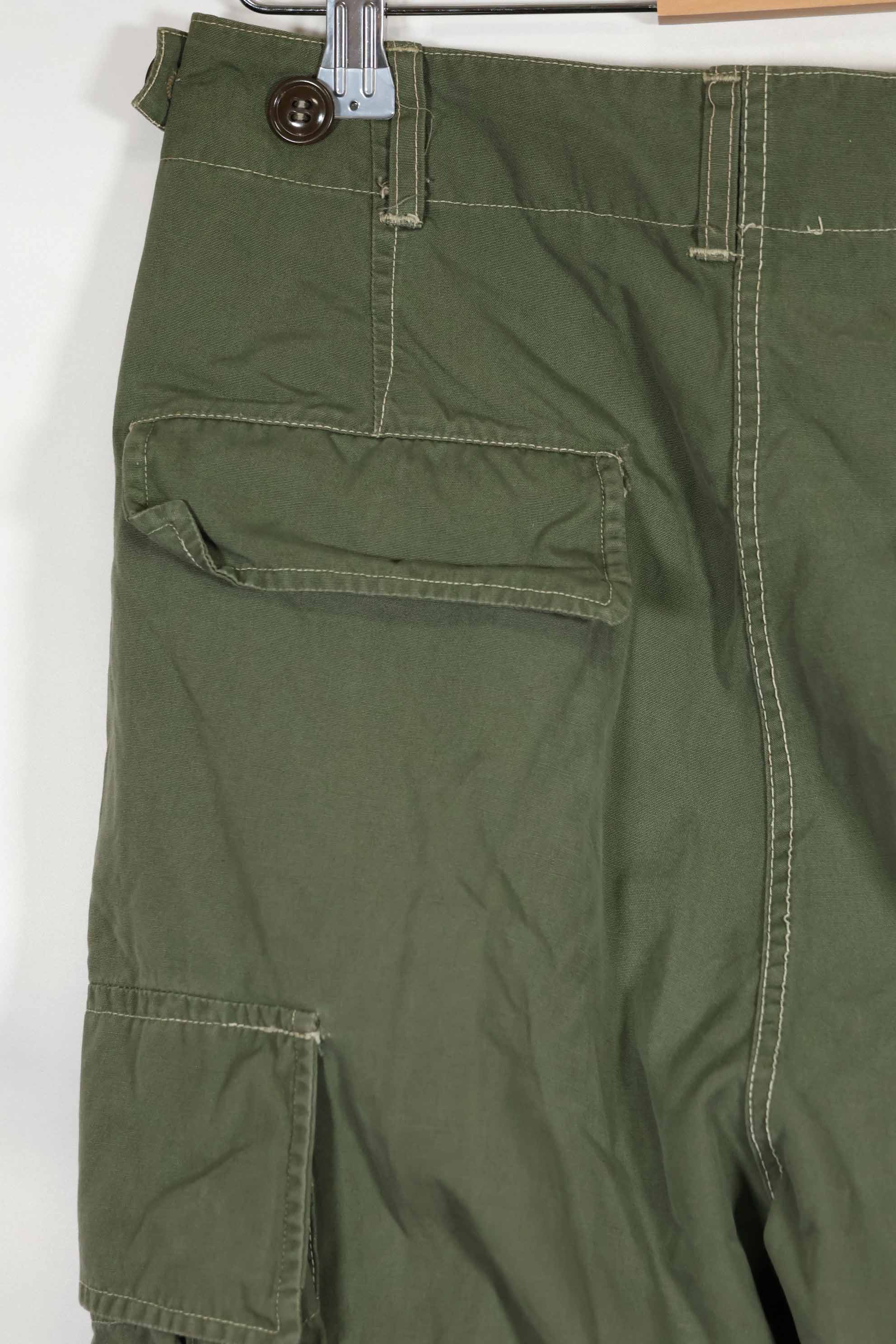 Mid-1960s Japanese locally made 2nd Model Jungle Fatigue pants, used.