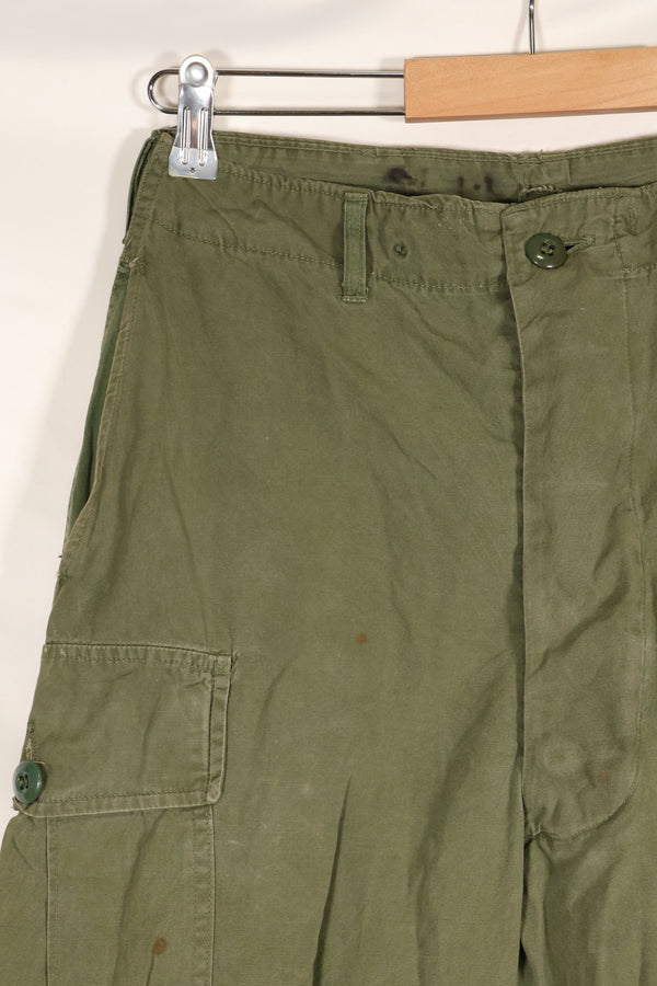 1964 Contract S-L with hemming 1st Model Jungle Fatigue Pants, used with fading.