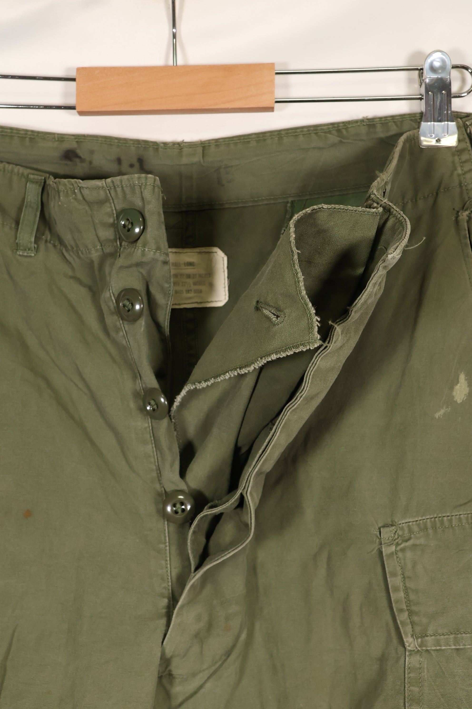 1964 Contract S-L with hemming 1st Model Jungle Fatigue Pants, used with fading.