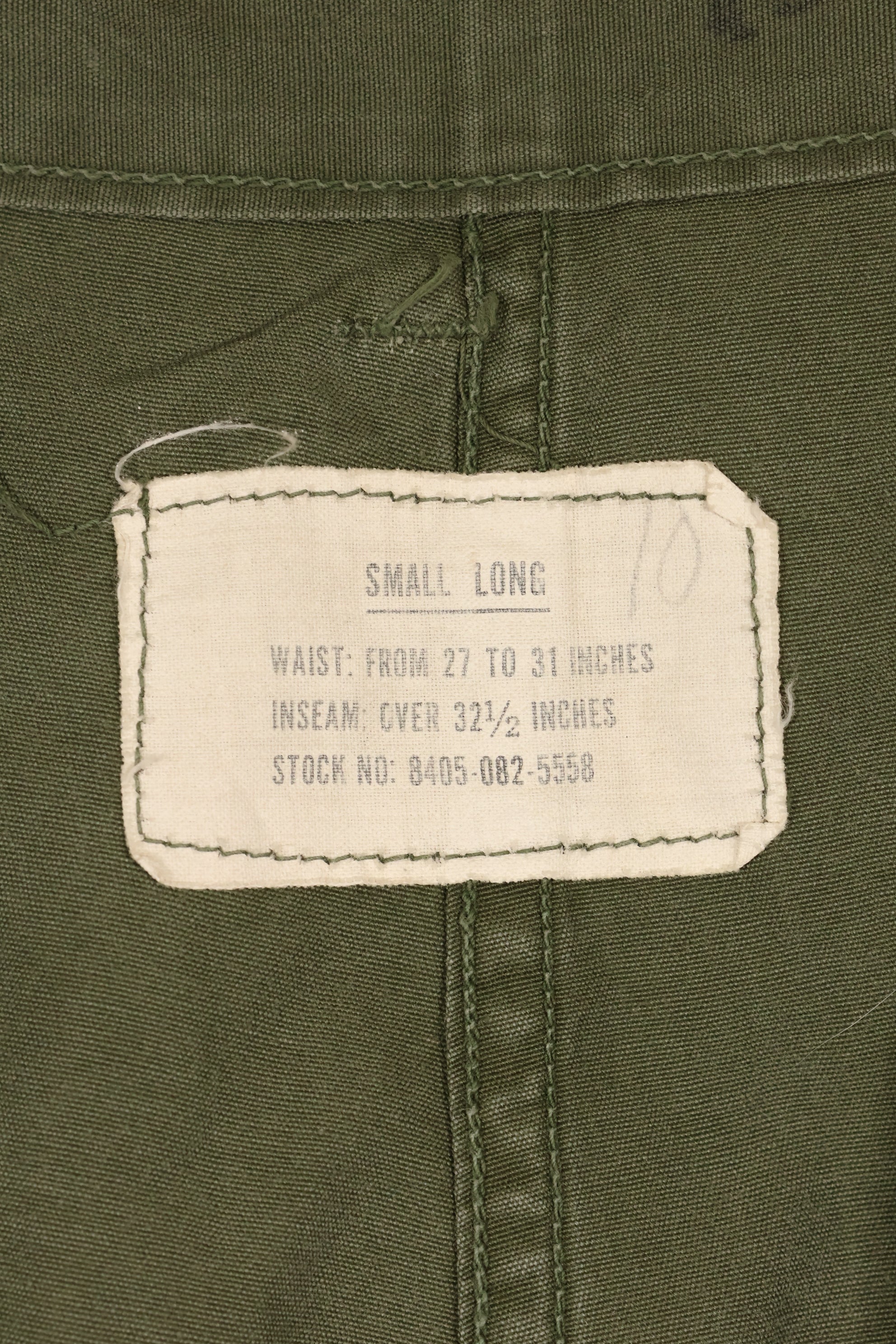 1964 Contract S-L with hemming 1st Model Jungle Fatigue Pants, used with fading.