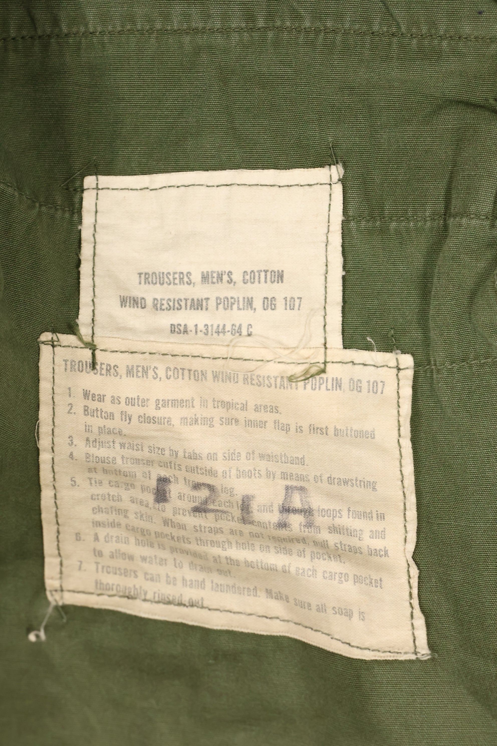 1964 Contract S-L with hemming 1st Model Jungle Fatigue Pants, used with fading.