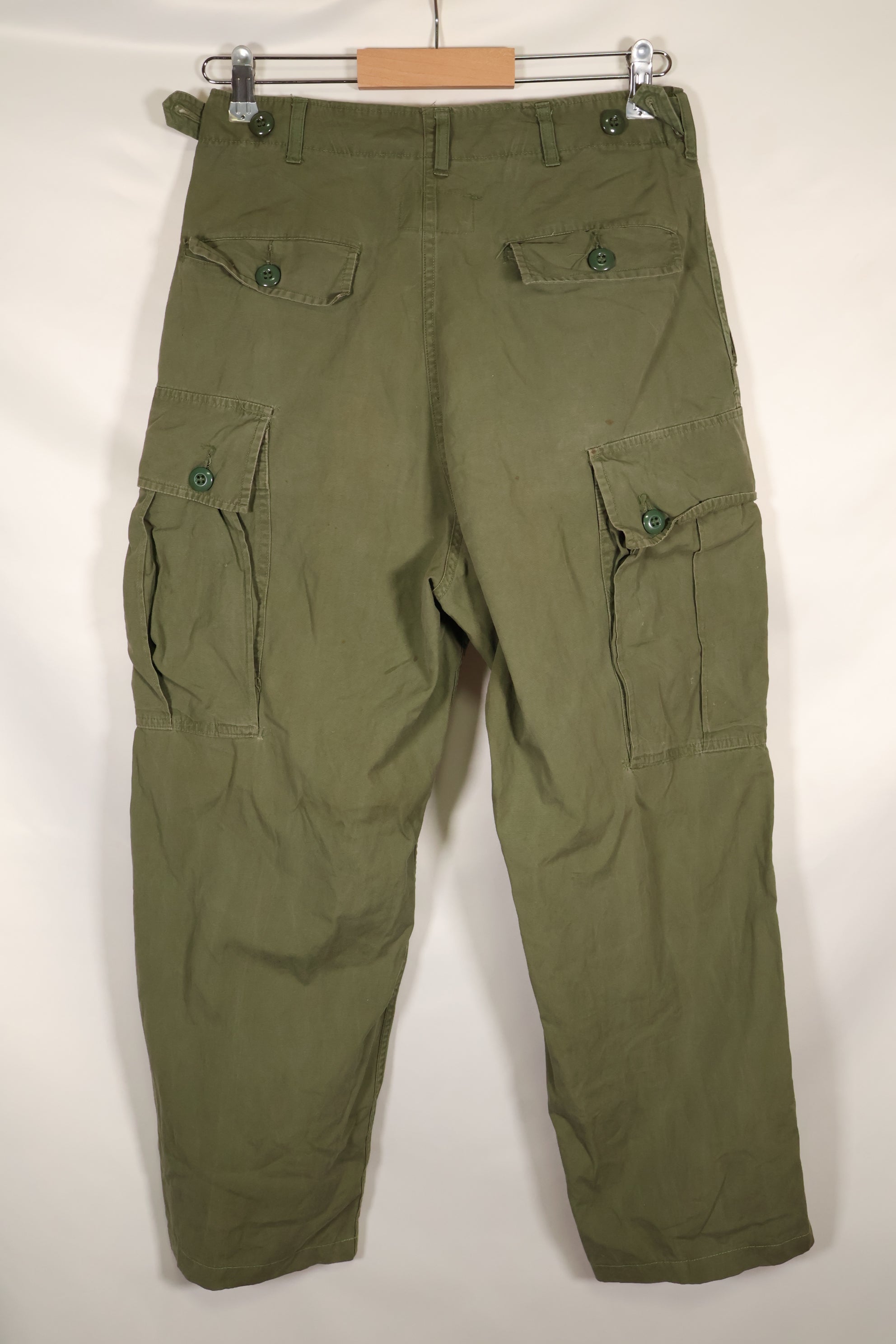 1964 Contract S-L with hemming 1st Model Jungle Fatigue Pants, used with fading.