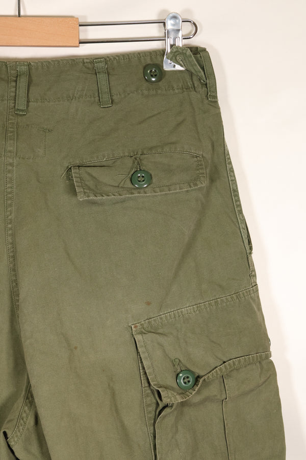 1964 Contract S-L with hemming 1st Model Jungle Fatigue Pants, used with fading.