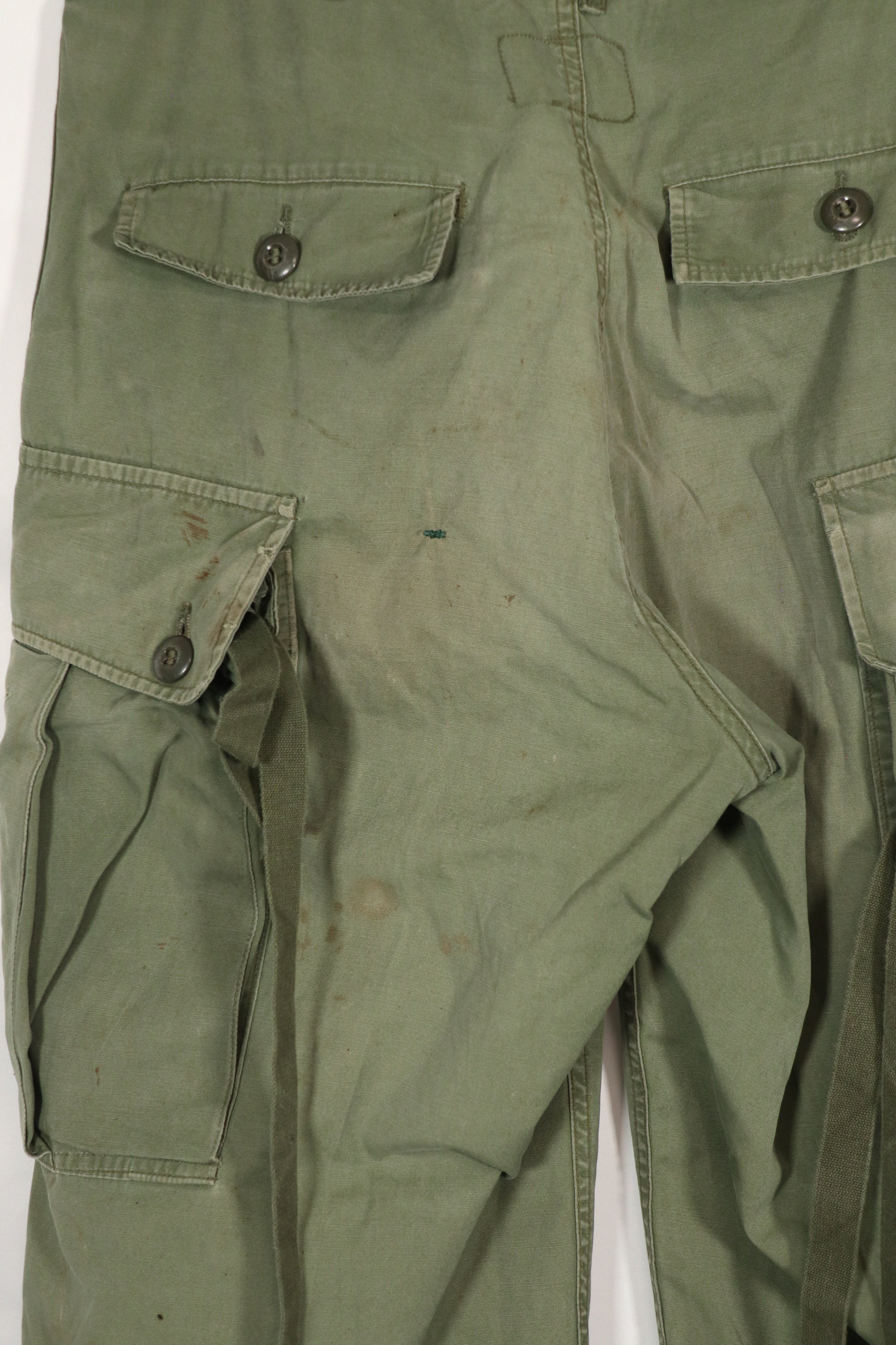 Real 1963 1st Model Jungle Fatigue Pants with leg ties, used.