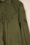 Real 1970 Australian Army OD Fatigue shirt with rank insignia, size unreadable.