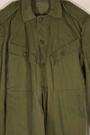 Real 1970 Australian Army OD Fatigue shirt with rank insignia, size unreadable.