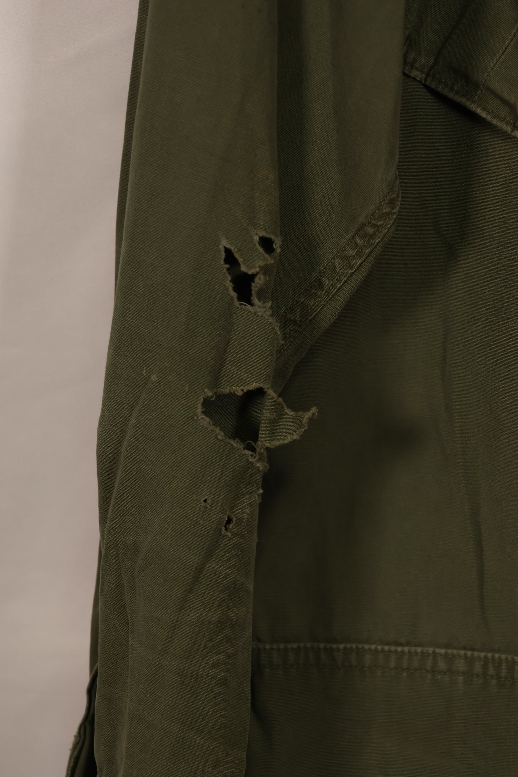 Real 1964 1st Model Jungle Fatigue Jacket, scratches, holes, poor condition.