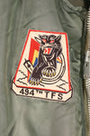 1950s, estimated size 40–42, U.S. Air Force B-15D flight jacket, modified with shearling, includes patches, used