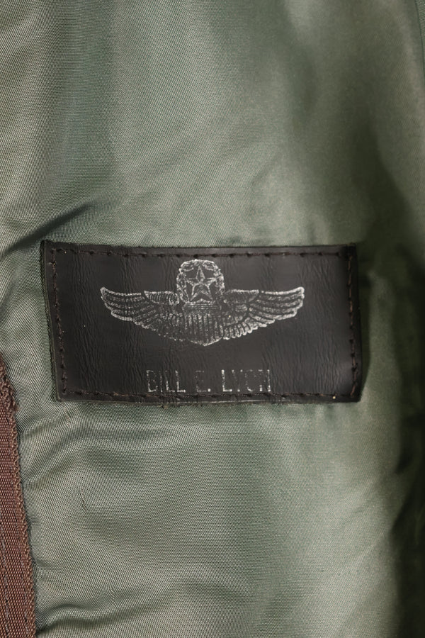 1950s, estimated size 40–42, U.S. Air Force B-15D flight jacket, modified with shearling, includes patches, used