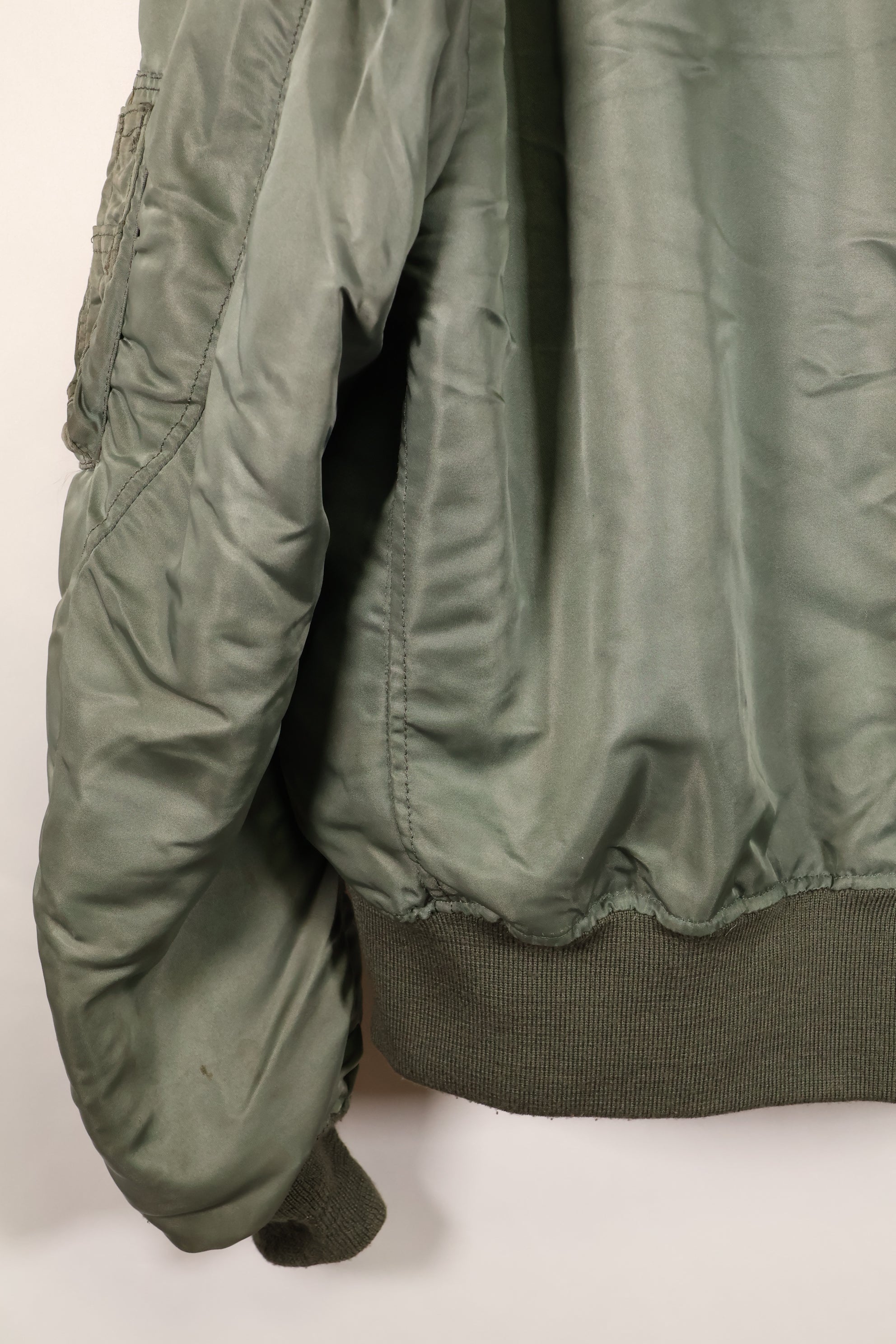 1950s, estimated size 40–42, U.S. Air Force B-15D flight jacket, modified with shearling, includes patches, used