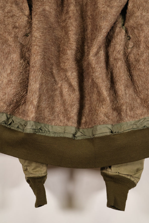 1940s, estimated age 38–40, U.S. Army Air Forces (USAAF) B-15A flight jacket, modified with shearling, used