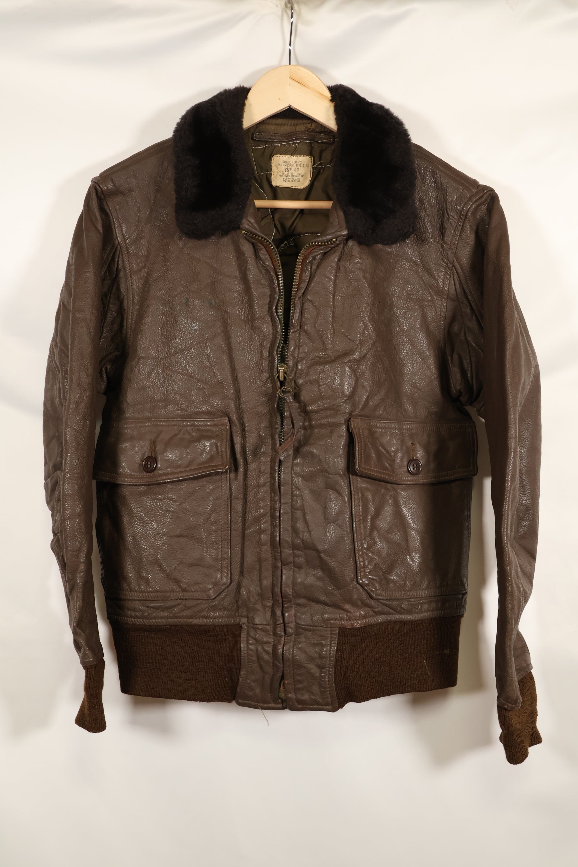 1977 Contract US Navy G-1 Flight Jacket with patches, size 40, good condition.