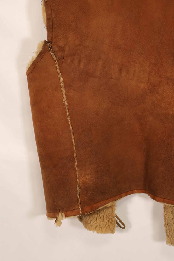 Civilian 1960s-70s sheepskin vest, used, scratches, stains.