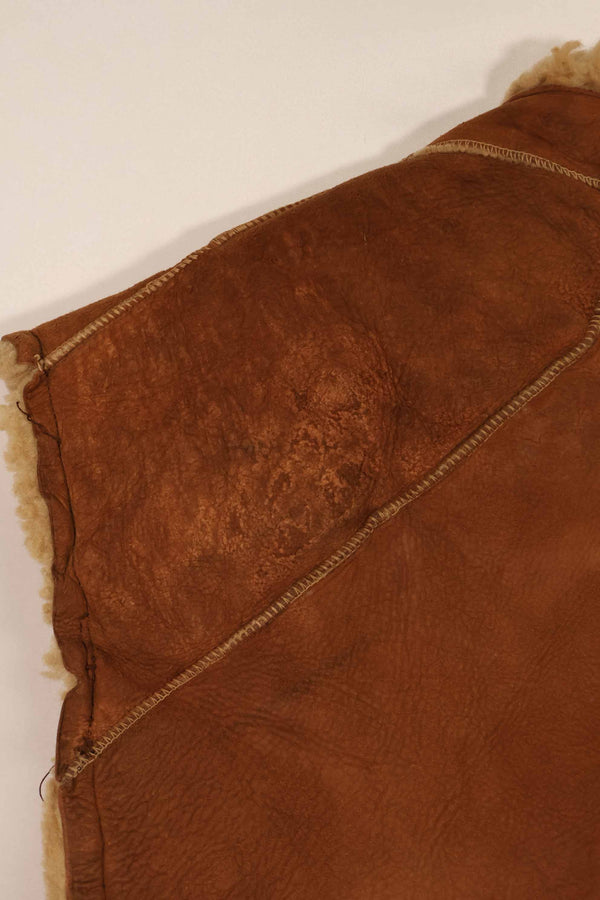 Civilian 1960s-70s sheepskin vest, used, scratches, stains.