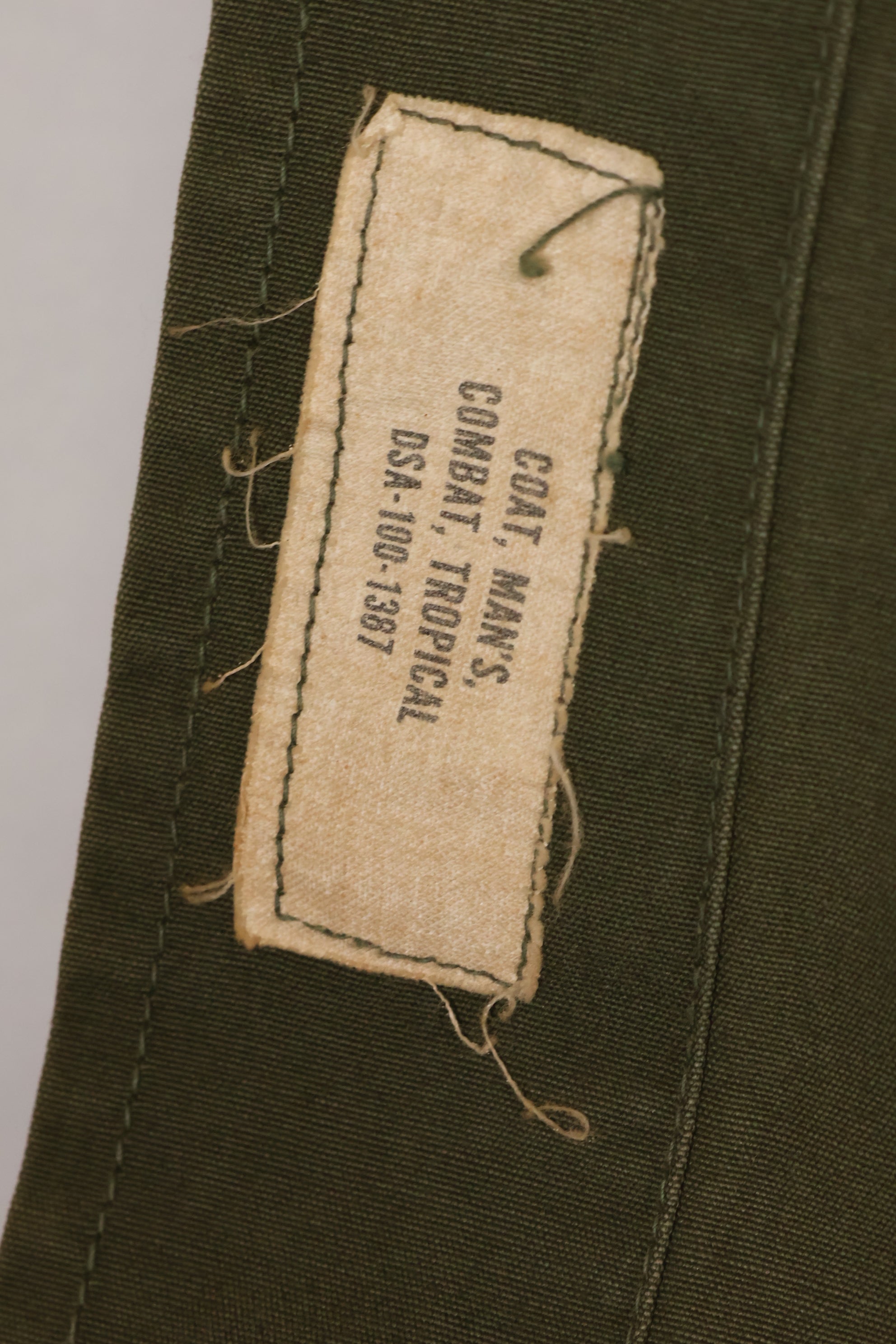 Circa 1965 M-R 2nd Model Jungle Fatigue Jacket, first attached, with patches, famous division, used.