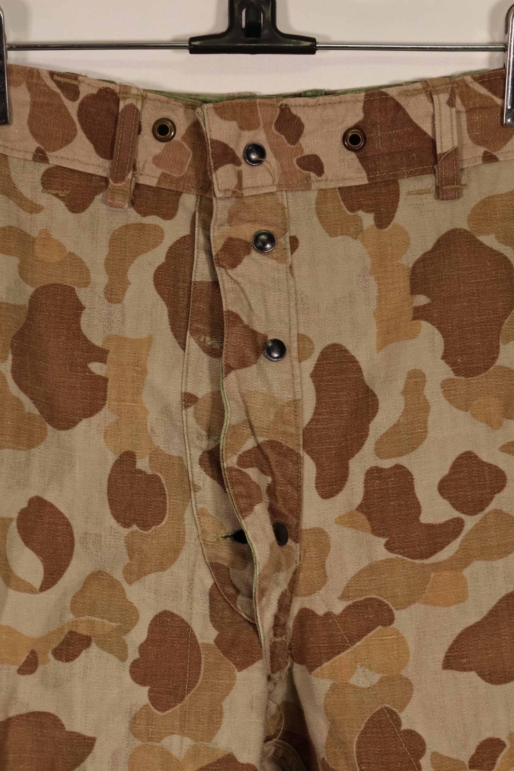 Real 1940s WWII U.S. Marine Corps P44 grogskin camouflage pants, used.