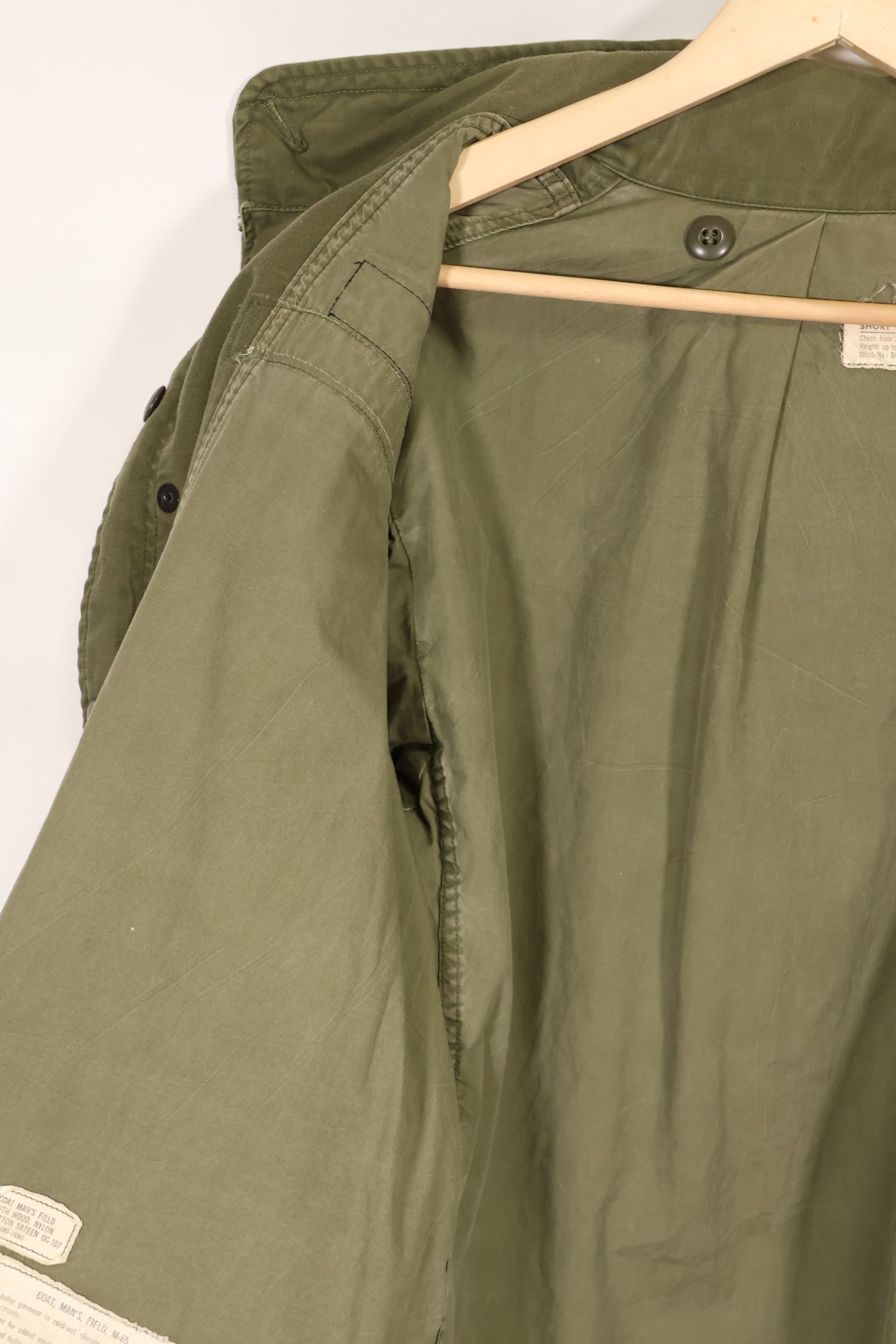 Real owned by former SF member, first model M65 field jacket, estimated 1965-1966, used.