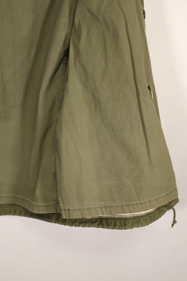 Real owned by former SF member, first model M65 field jacket, estimated 1965-1966, used.