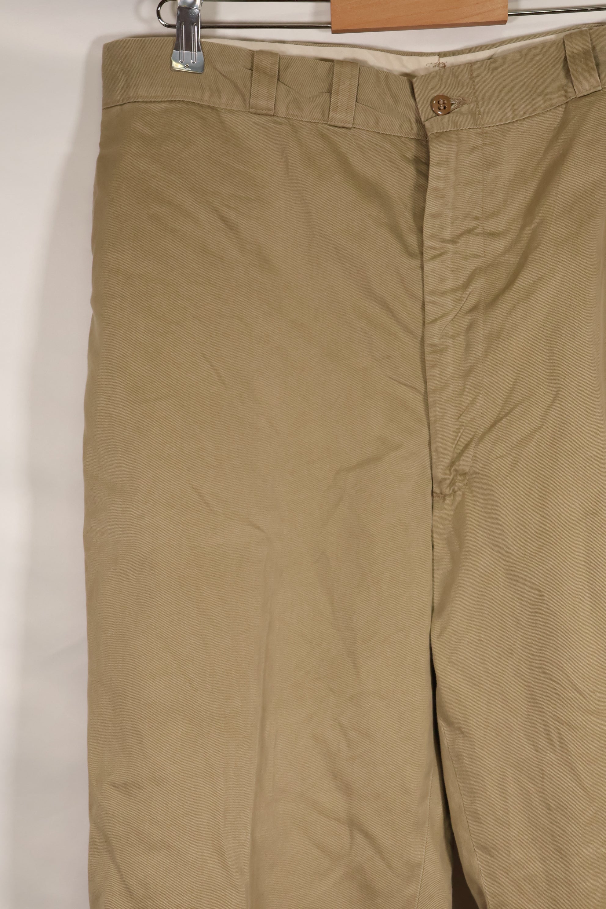 1960s, estimated 34-36 US Army cotton khaki pants, used.