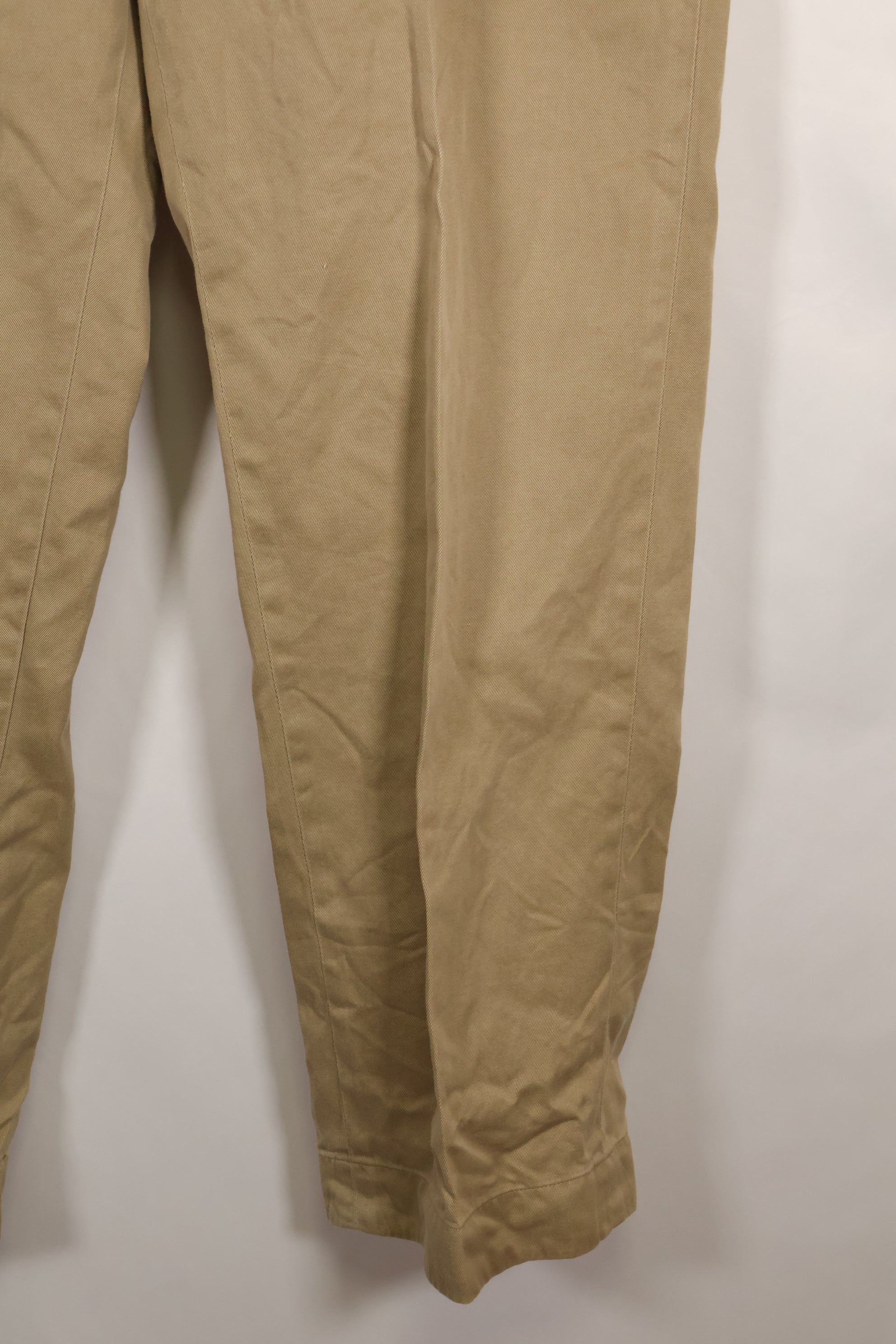 1960s, estimated 34-36 US Army cotton khaki pants, used.