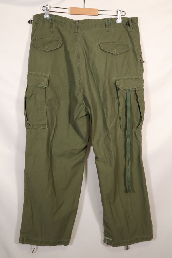 1960s-70s, estimated M-R U.S. Army M65 cotton field pants, used.