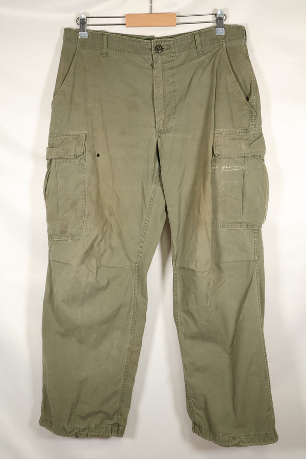 1969 Contract M-R 4th Model Jungle Fatigue Pants, stained, faded, used.