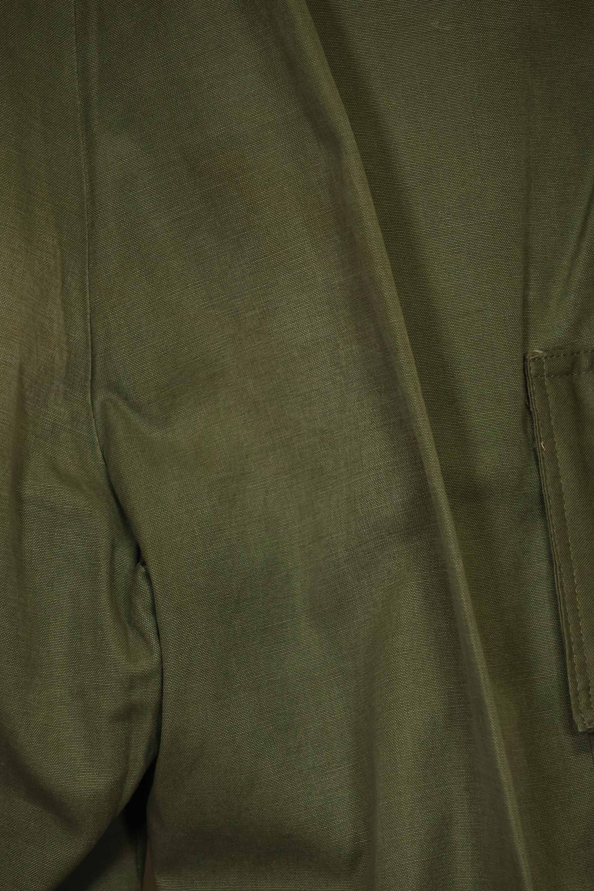 1940s-50s US Army M45 cotton field pants with modified cargo pockets, airborne use, used, B