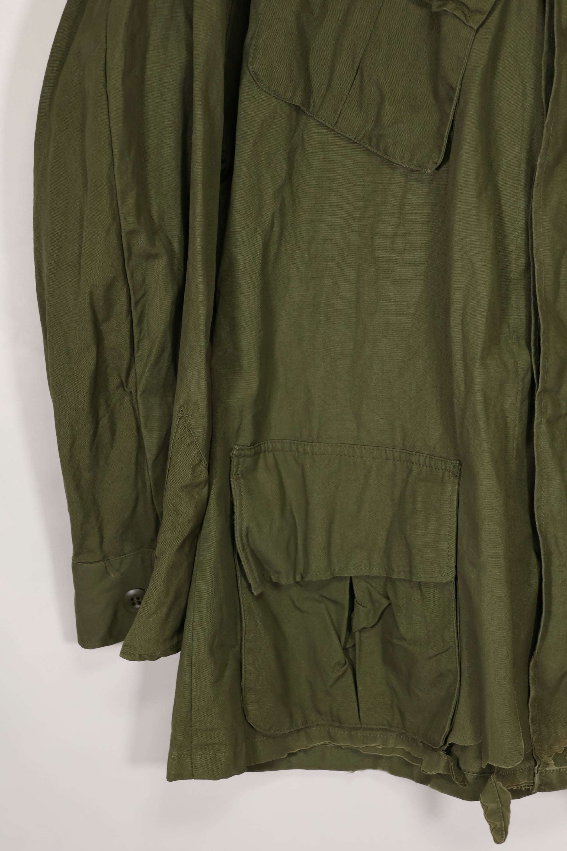 Real 1966-1967 3rd Model Jungle Fatigue Jacket L-R with damage.