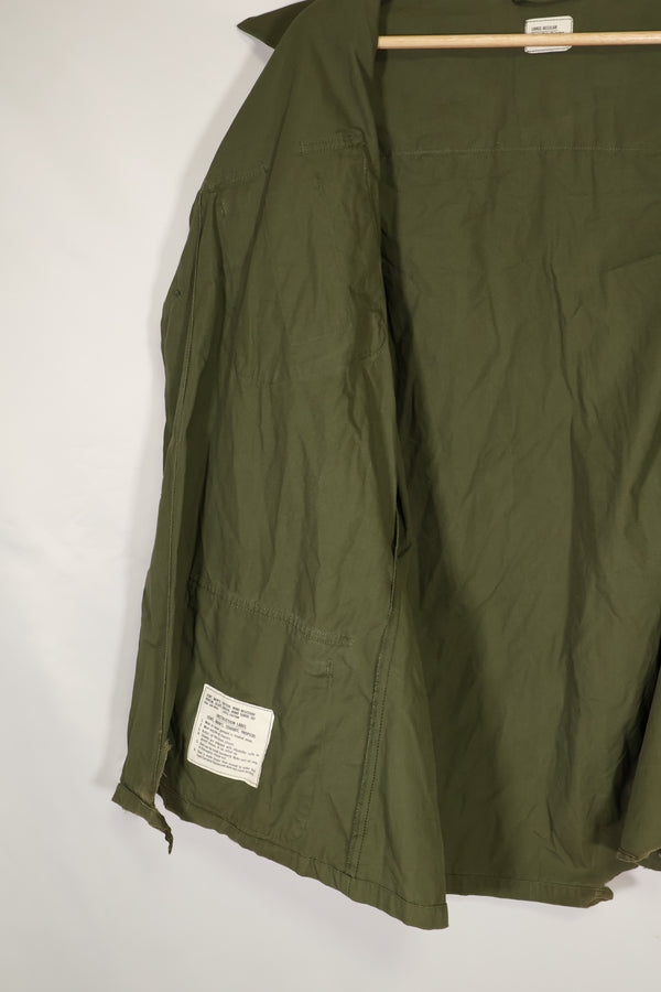 Real 1966-1967 3rd Model Jungle Fatigue Jacket L-R with damage.