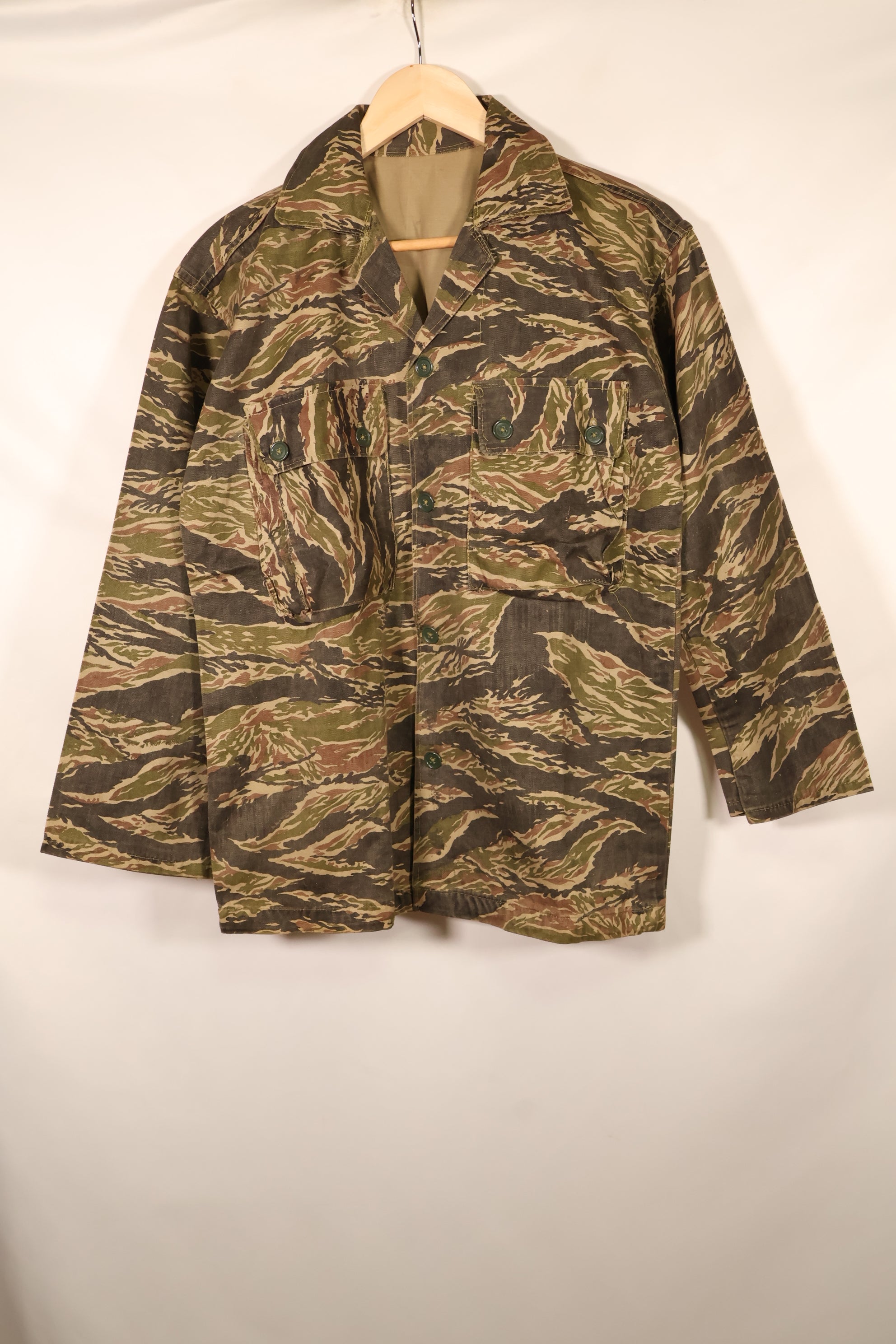 Late 1960s | Locally made | Estimated to be made in Vietnam or Thailand | Tiger-striped shirt | Used