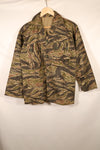 Late 1960s | Locally made | Estimated to be made in Vietnam or Thailand | Tiger-striped shirt | Used