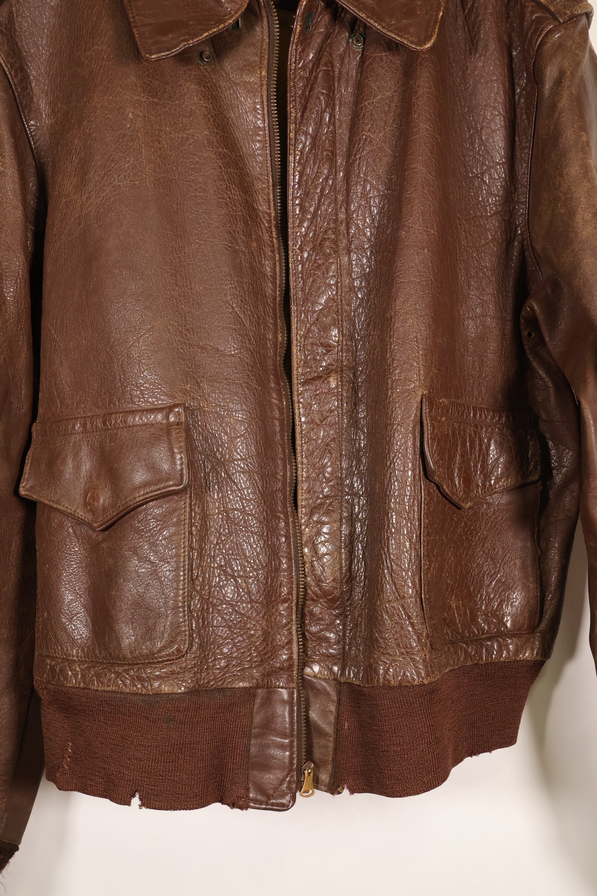 1940s size 42 WWII U.S. Army Air Corps USAAF A-2 flight jacket with name, used.