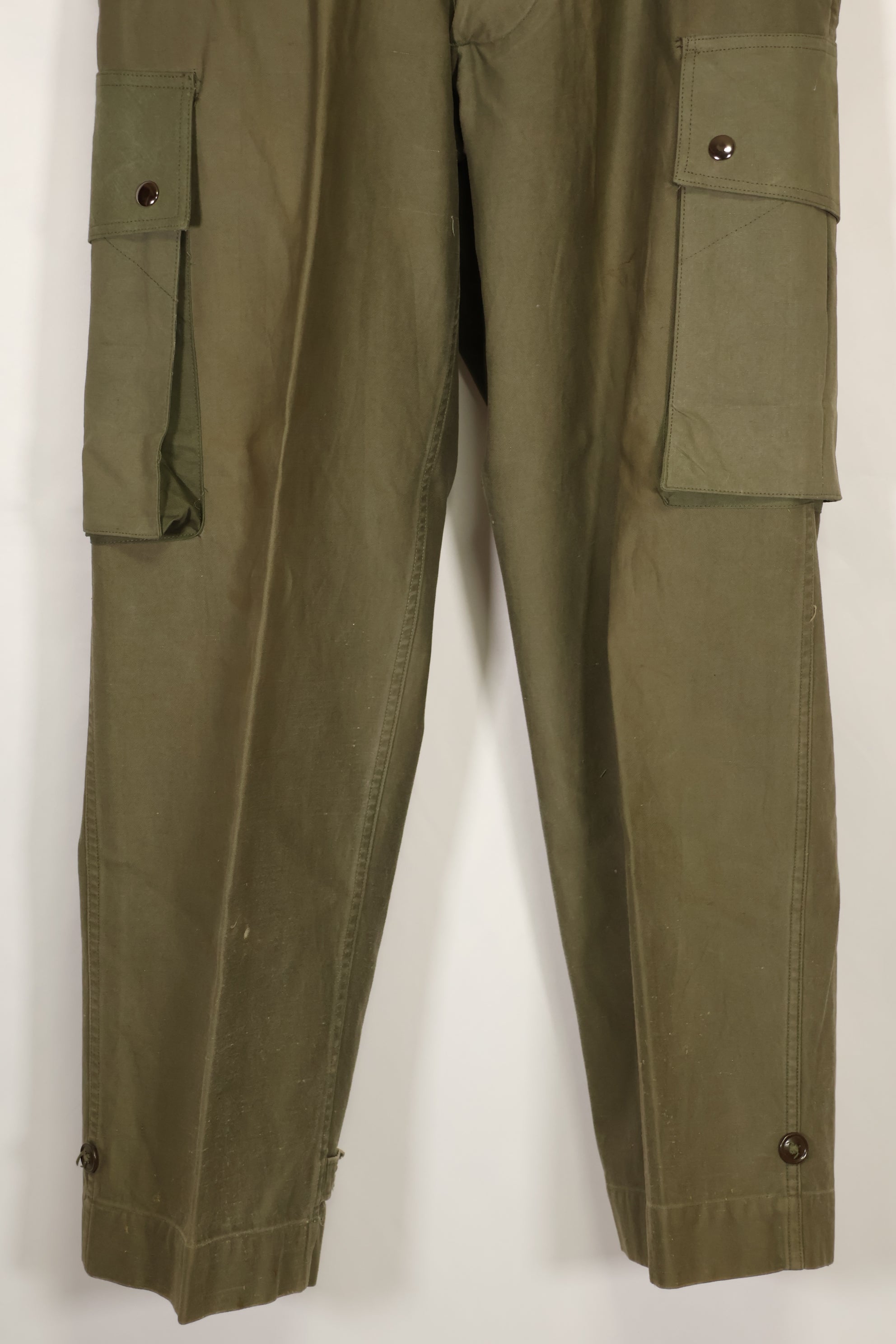 Real U.S. Army M45 pants with additional pocket modification, used.