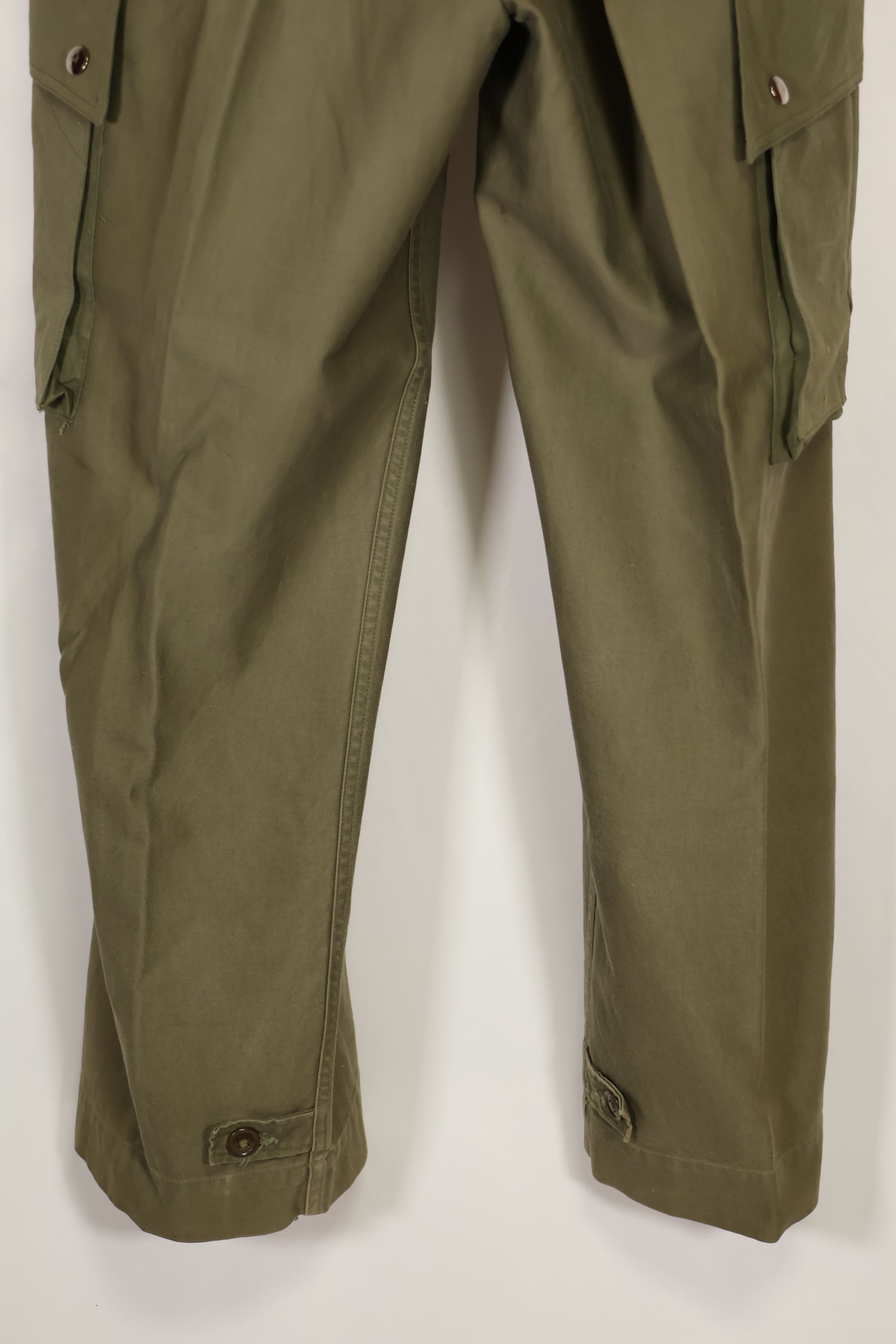 Real U.S. Army M45 pants with additional pocket modification, used.