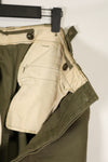 Real U.S. Army M45 pants with additional pocket modification, used.