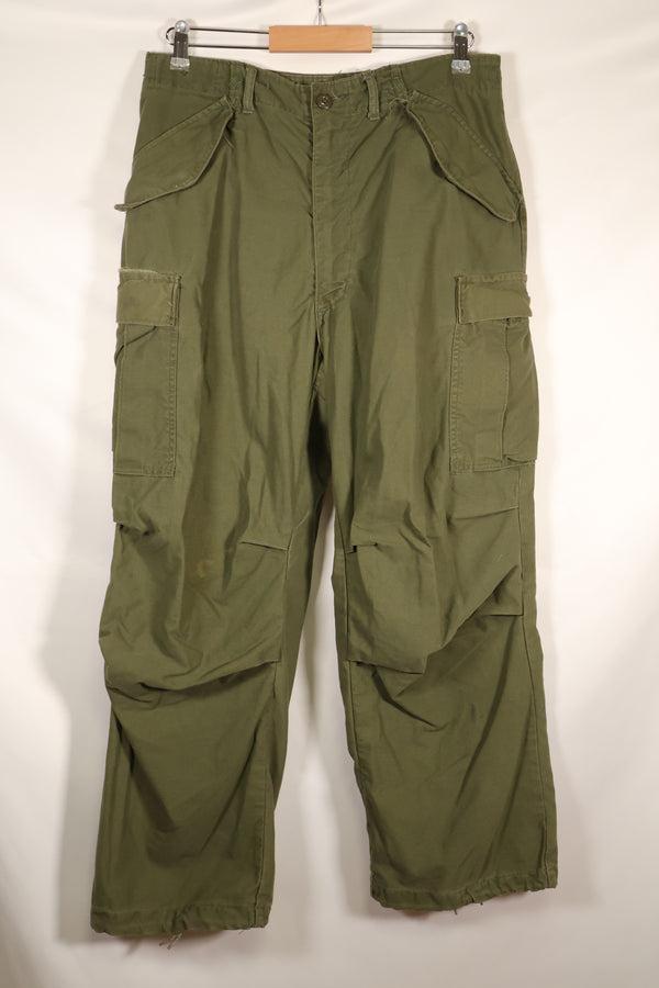 1970s lot, estimated size M-R, M65 field pants, cold weather specs, used.