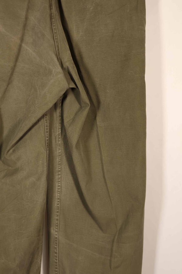 Real late 1940s - early 1950s M45 OD cotton field pants, used, strong signs of use.