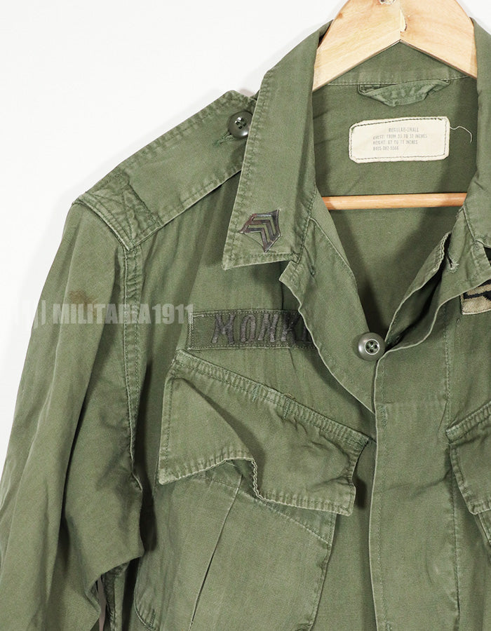 Real 2nd Model Jungle Fatigue Jacket, used, with patches and rank insignia.