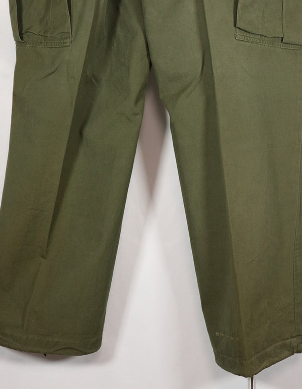 Real 1967 Poplin jungle fatigues pants, used, button damaged.