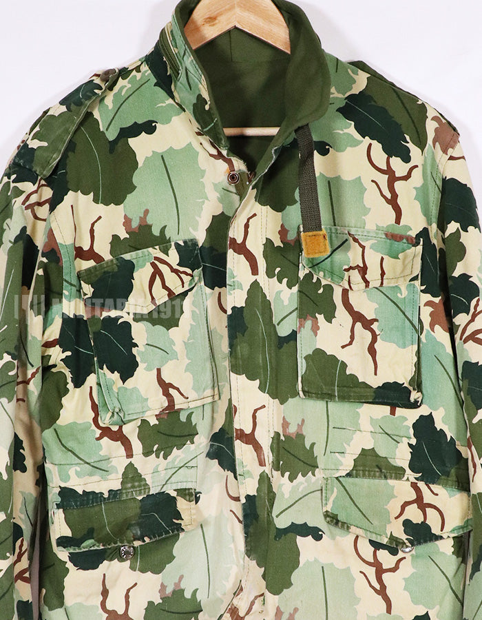 Civilian Vintage Mitchell camouflage M65 field jacket, used.