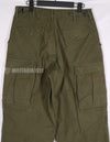 Real 1973 M65 cotton field pants, used, faded.